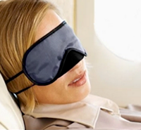 woman asleep on a plane