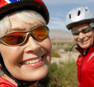 Cycling couple with custom sunglasses: http://health.sunnybrook.ca/navigator/finding-a-reliable-pair-of-sunglasses-may-be-harder-than-you-think/
