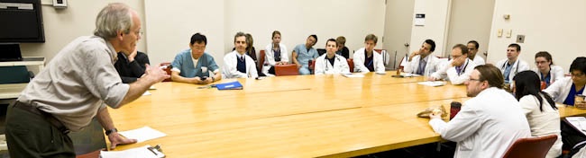 A group of Sunnybrook staff around a table