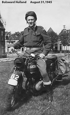 Fred Arsenault on a motorcycle, Bolsward Holland, August 31, 1945