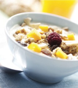 Whole grain oatmeal topped with fresh fruit