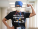 Nurse wearing tshirt: We Stand And Fight COVID-19