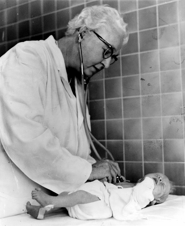 Virginia Apgar and baby doing tests