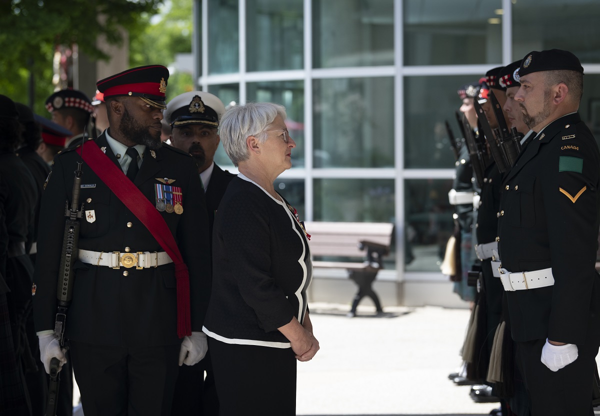 Standing row of Canadian veterans in uniform