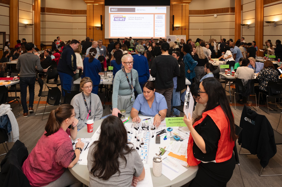 Staff from the Orthopedic and Neurosurgical Unit strategize their unit’s approach to a Code Orange. Critical Care Unit staff working through the mock exercise.