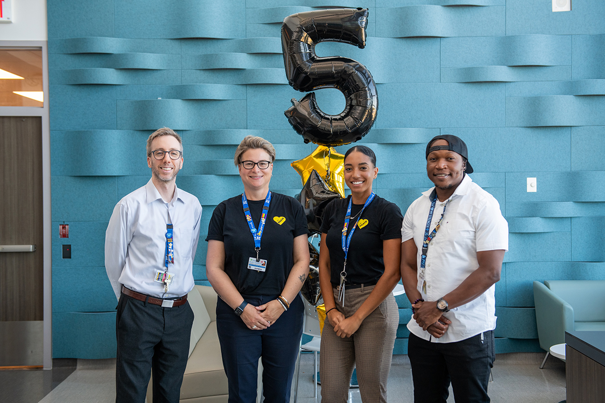 Corey Freedman, Manager of Trauma Services; Brandy Tanenbaum, Injury Prevention Coordinator; Elena Gordon, BRAVE case manager and Michael Lewis, also a BRAVE case manager.
