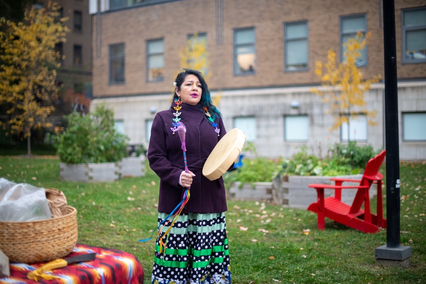 Sara Luey during a song and drumming performance