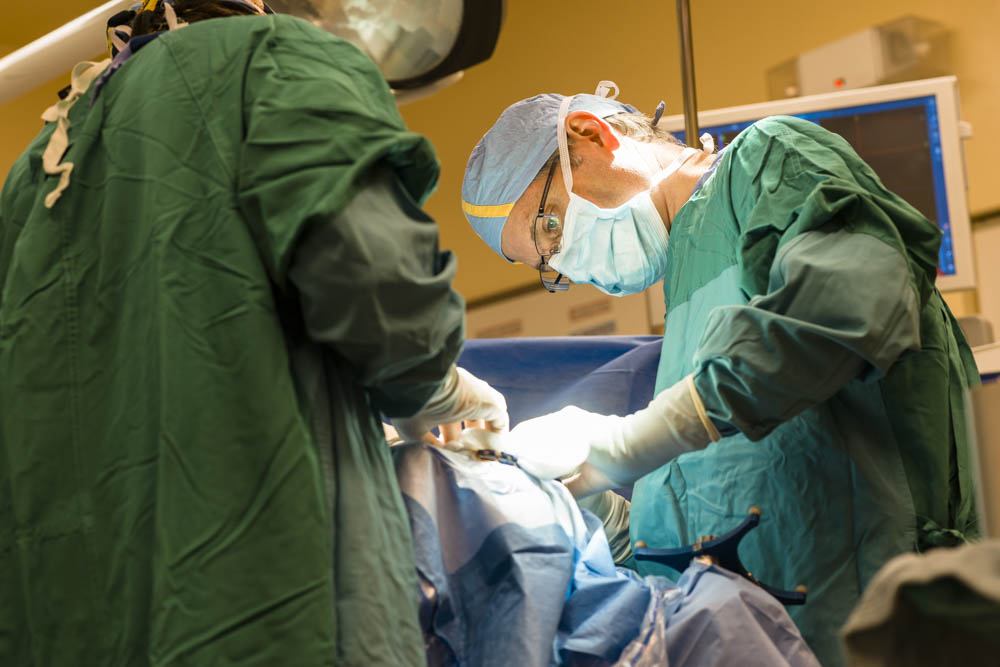 Surgeon removes the brain tumour