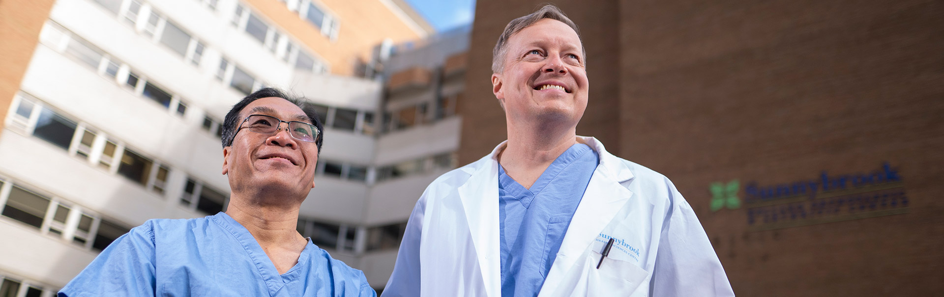 Orthopaedic surgeons Dr. Paul Wong from Michael Garron Hospital and Dr. Markku Nousiainen from Sunnybrook  outside Sunnybrook’s Holland Centre 