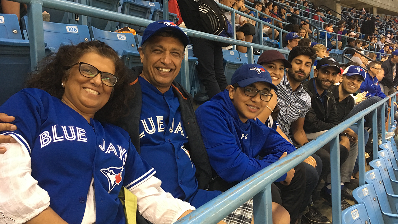 Karima and her family at a Blue Jays game