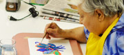 A patient works on a watercolour painting in our recreational therapy program.  Recreational therapy is the difference between existing and living.