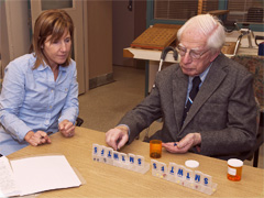 An image of an occupational therapist working with one of our patients.