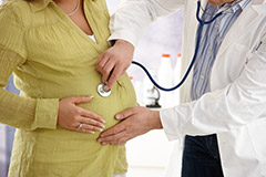 Checking pregnancy with stethoscope