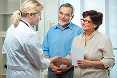 Physician communicating with patients